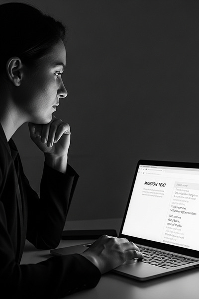 Nonprofit team brainstorming search terms on sticky notes